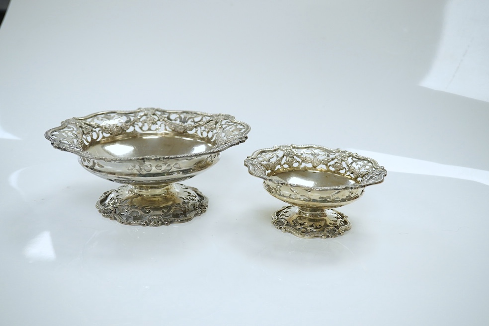 Two graduated pairs of George V pierced silver bon bon dishes, makers Mappin & Webb, 1924, diameter 13cm and 9cm, 17oz. Condition - good